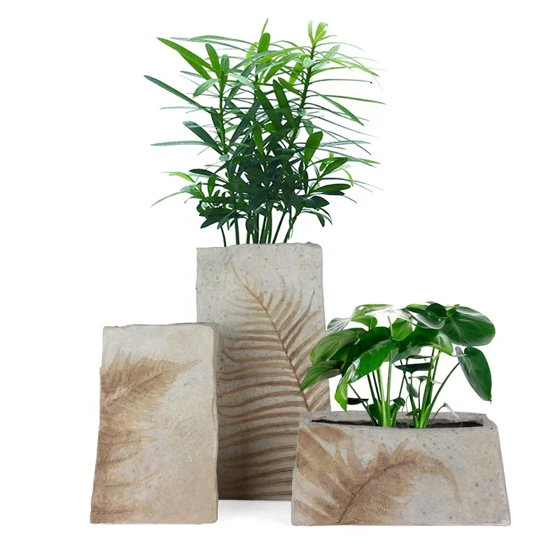 Custom Artificial Resin Quartz sand Fossil Leaves Flower Vase for Indoor Home Decor manufacture