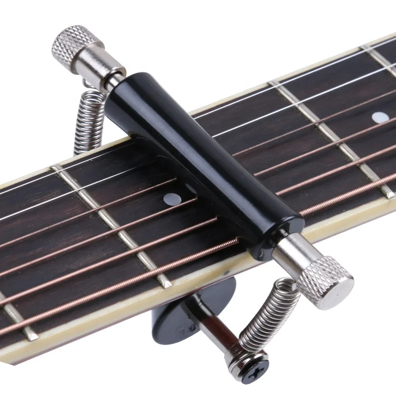 

Wholesale Musical Instrument Parts Guitar Clip That Can Move The Pitch Scroll On The Fretboard Sliding Capo Rolling Guitar Capo