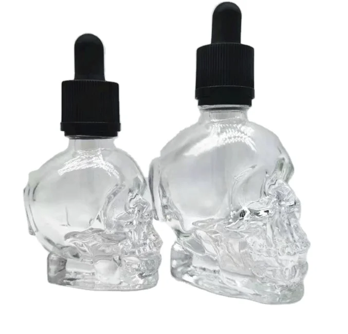 

Cornucopia Skull Glass Dropper Bottles (2oz Clear) Bitter Flavor Tattoo and Beard Oil Dispenser