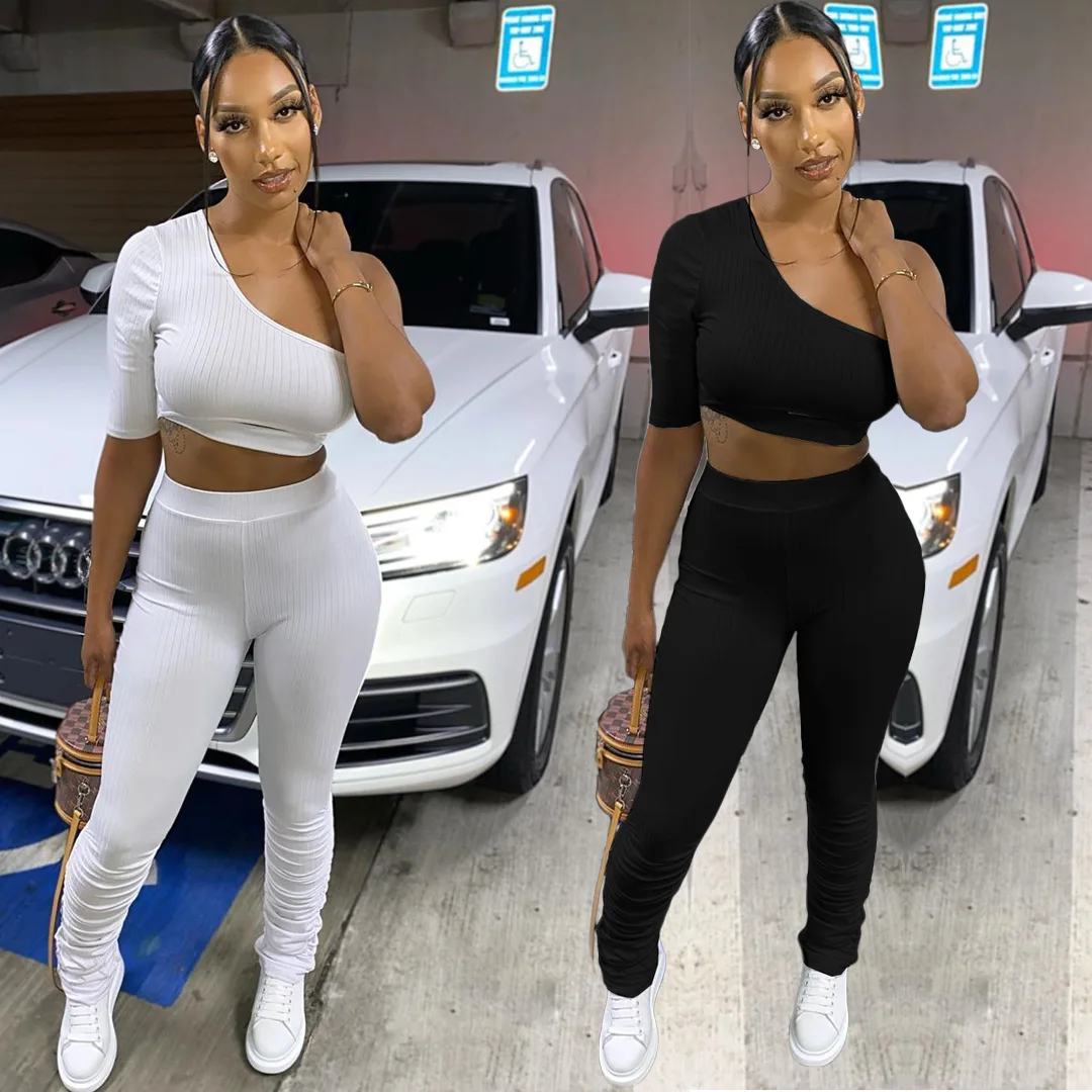 

Wholesale 2021 new solid stacked pants one shoulder half sleeve crop top two piece set women clothing, Photo shows