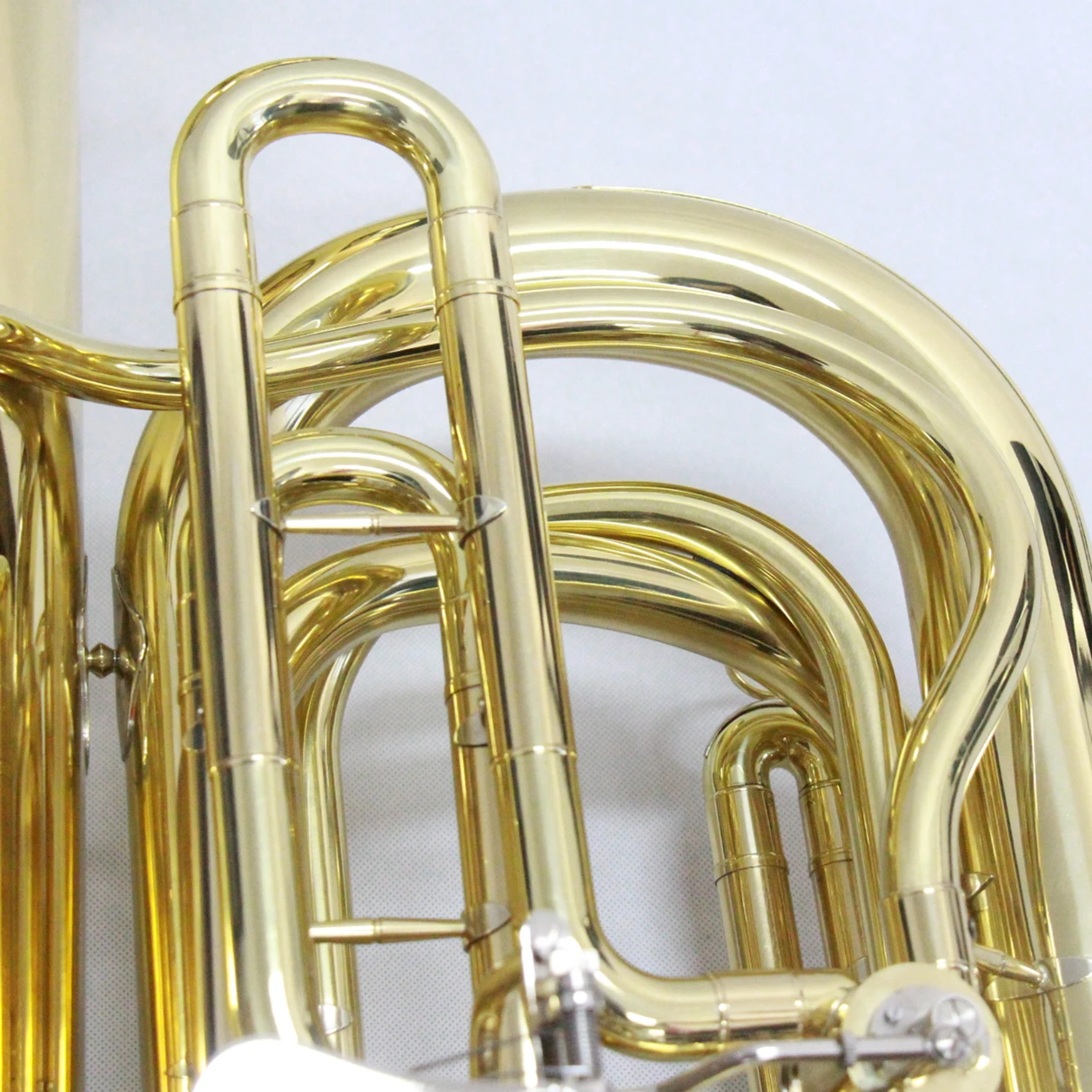 
Made in China brass material gold lacquered tuba 