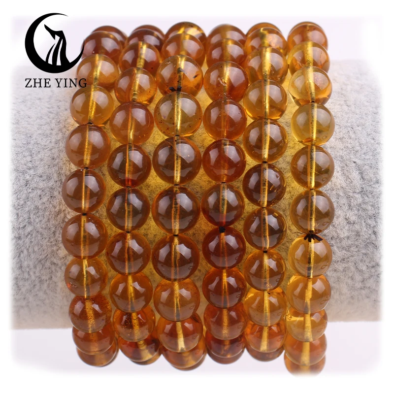 

Zhe Ying 8mm round amber bracelet wholesale amber beads amber stone bracelet trade