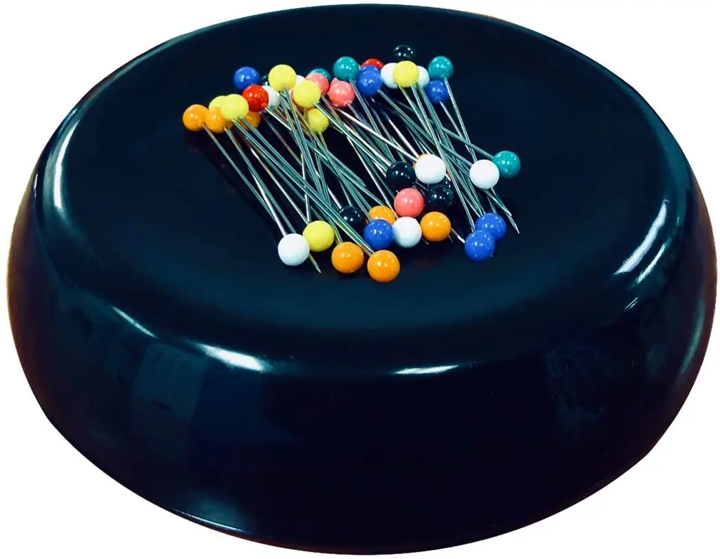 

Magnetic polychrome sewing needle pad with 50 plastic pins, Shown