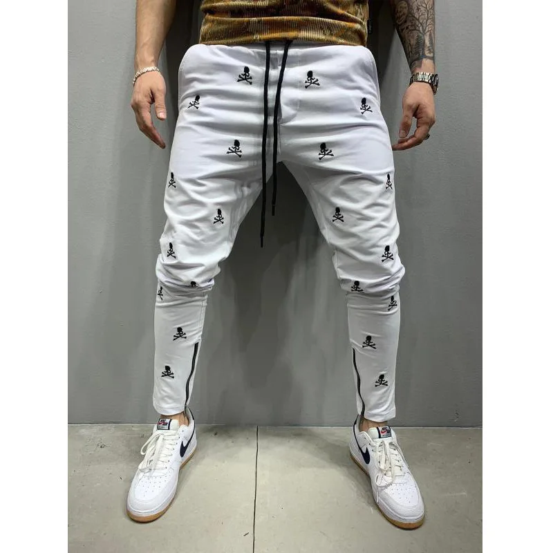 

New hip-hop fashion embroidery casual self-cultivation trend sports feet zipper trousers men white