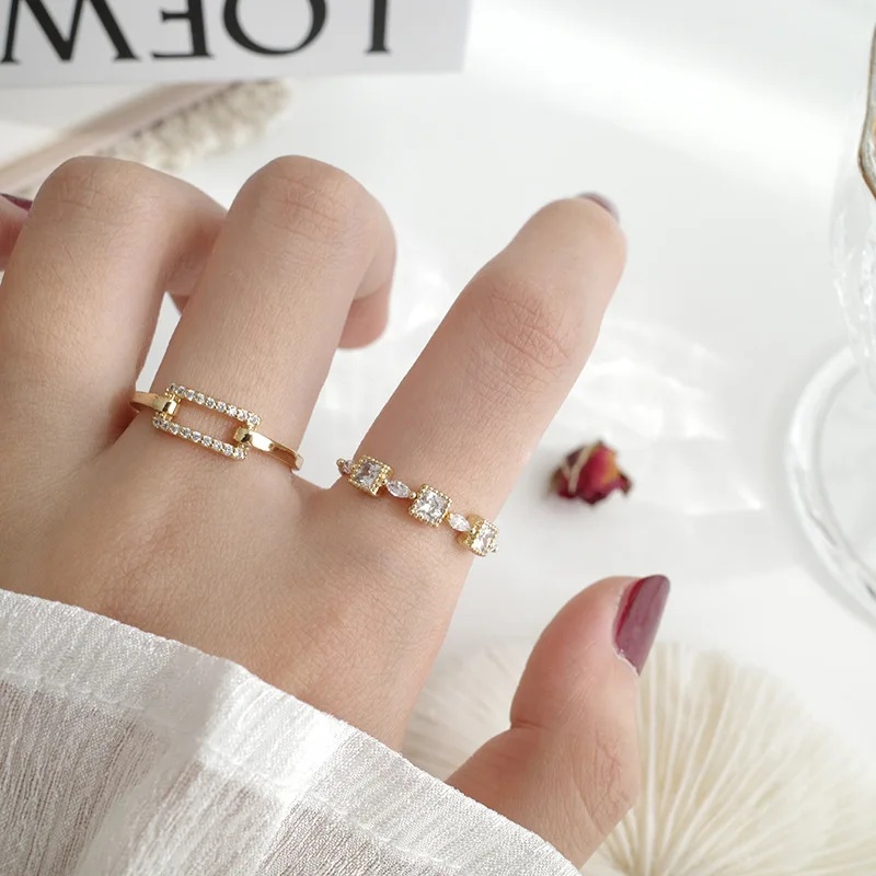 

Fashionable Crystal Hollow Rectangle Finger Ring Golden Plated Geometric Ring