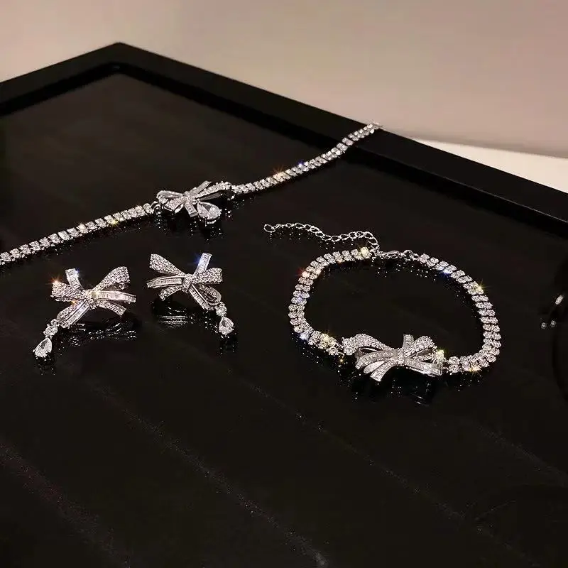 

2021 wholesale new Korean fashion micro inlaid zircon bow earring necklace and bracelet jewelry sets, Picture