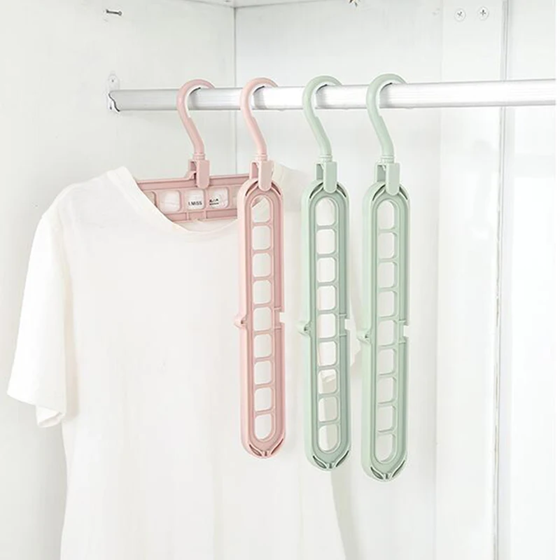 

Wholesale 9 Holes Space Saving Magic Plastic Hangers Multiple Use Adjustable Wonder Hanger