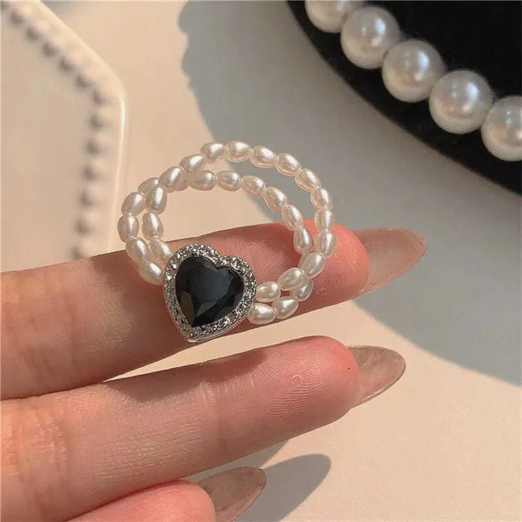 

Imitation Pearl Black Peach Heart Ring Elastic Adjustable Double Layer Pearl Retro Niche Super Cool Ring Women, Picture shows