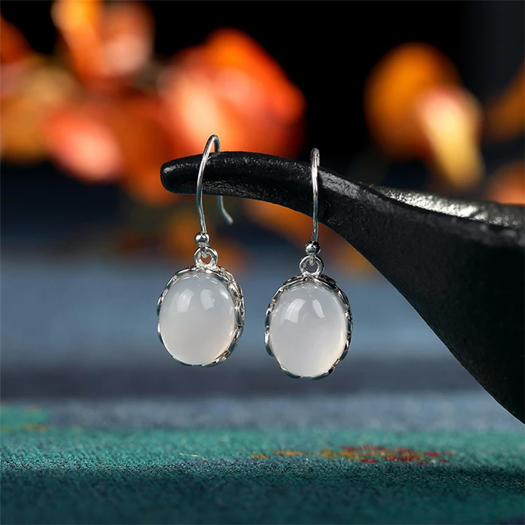 

S925 sterling silver retro decorative white chalcedony inlaid earrings women's silver earrings wholesale AP2