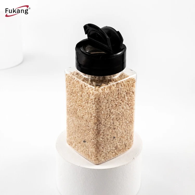 

Wholesale kitchen plastic spice jars and salt bottle pepper chili shaker garlic spice bottle with customized lid