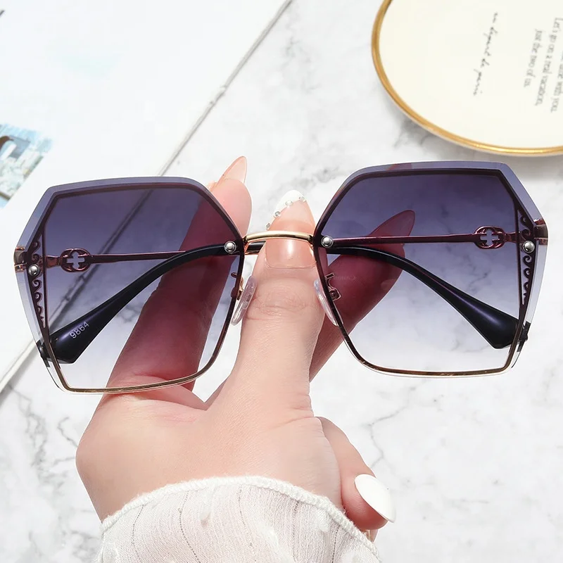 

2022 New Ins European And American Trend Ocean Film Frameless Cut-Edge Sunglasses Custom Logo Sunshade Women Sunglasses, 7 colors
