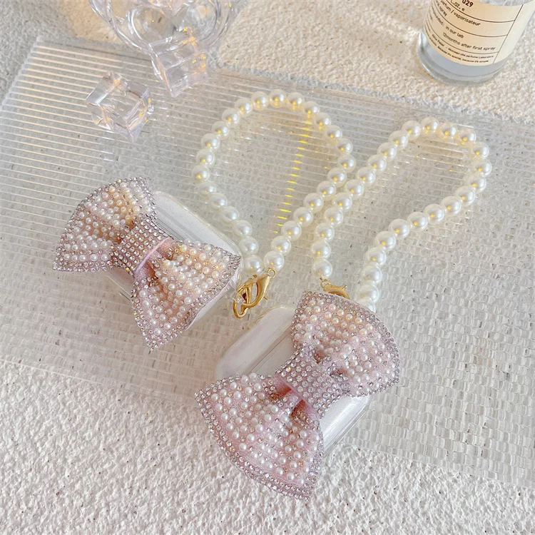 

2021 Fashion Luxury Girly Shockproof Glitter Pink Bow with Pearl Bracelet Keychain Soft Case For Apple Airpods 1 2 3 Pro, Cool style earphone cases for apple airpods