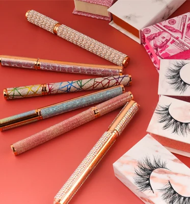 

Wholesale eyelashes adhesive eyeliner glue pen Black &Clear liquid lashes glue pen with custom logo box Water proof lash glue, Natural black color