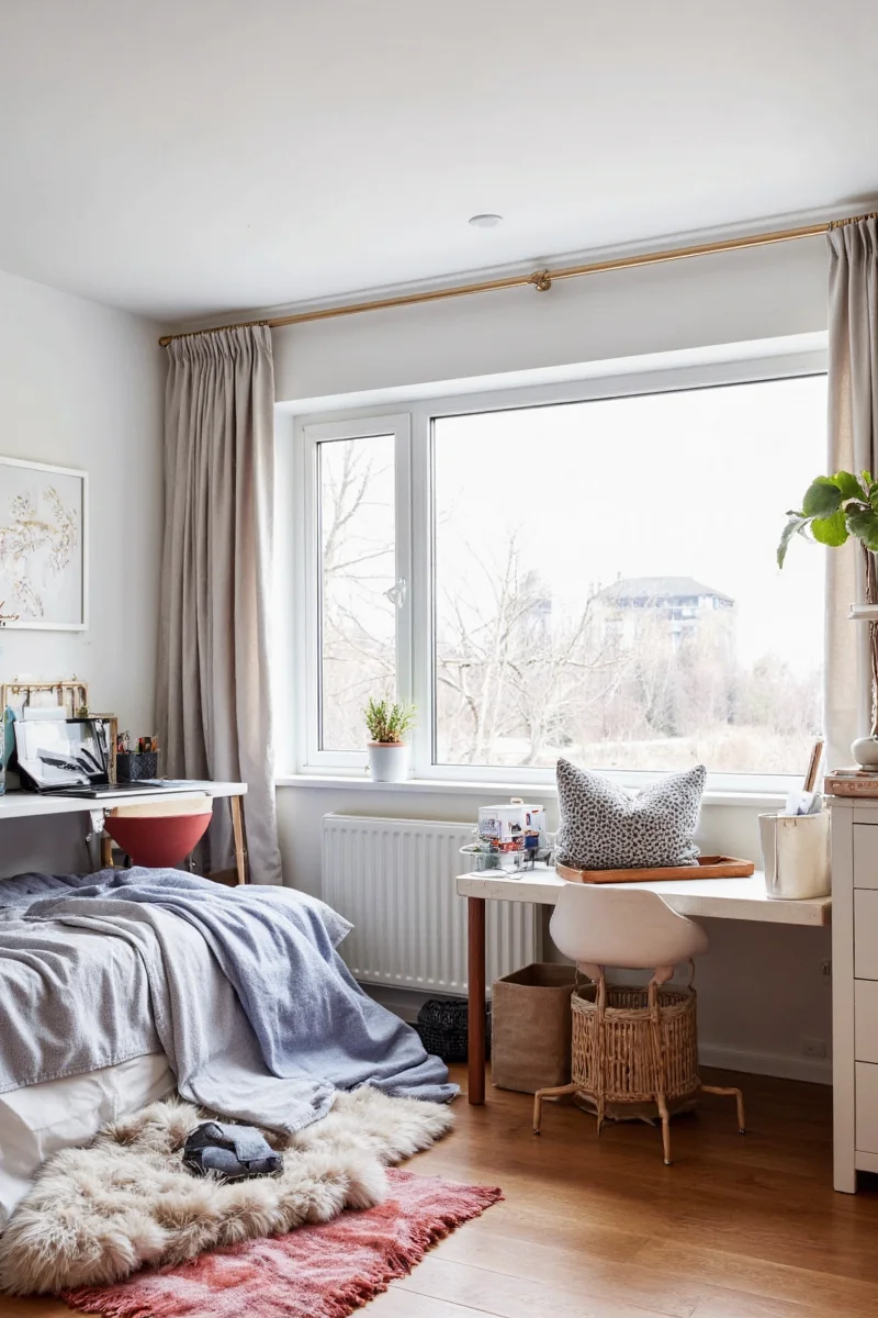 Teen room decorated with posters and personal items