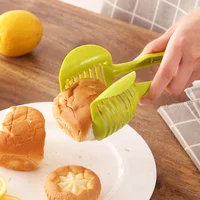 

Wholesale Plastic Handheld Manual Fruit Lemon Potato Tomato Cutter Slicer