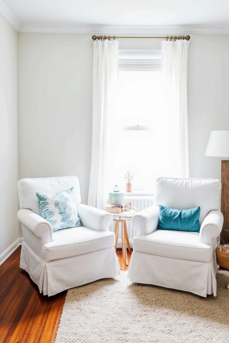 Family-friendly living room with white slipcovered chairs