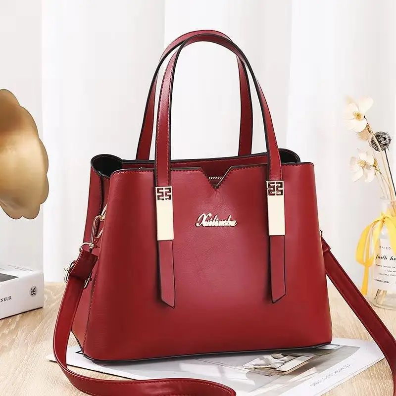 

DL162-22 The latest wholesale women's bag luxury handbag leather solid color shoulder bag, Red, black....