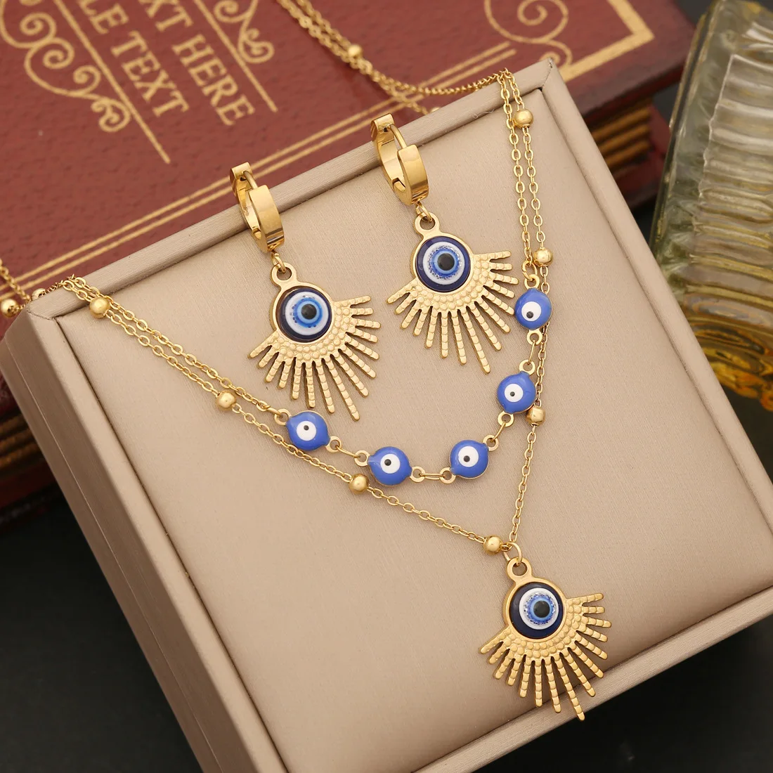 

2023 New Non Tarnish Stainless Steel Necklace Earring Bracelet Set 18k Gold Plated Devil Eye Jewelry Set For Women