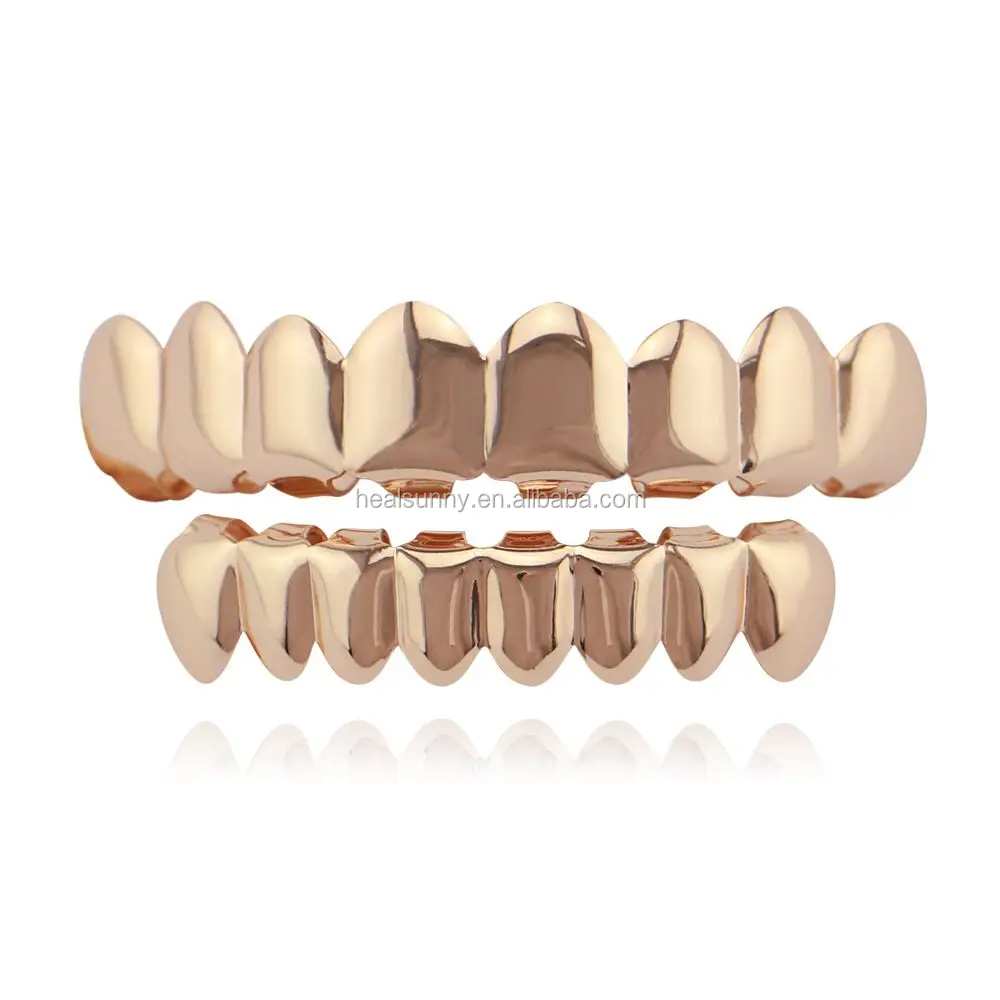 

Custom Gold Color Iced Out Rhinestones Teeth Grillz Top&Bottom Vampire Teeth Caps Hip Hop Blingbling Copper Body Jewelry