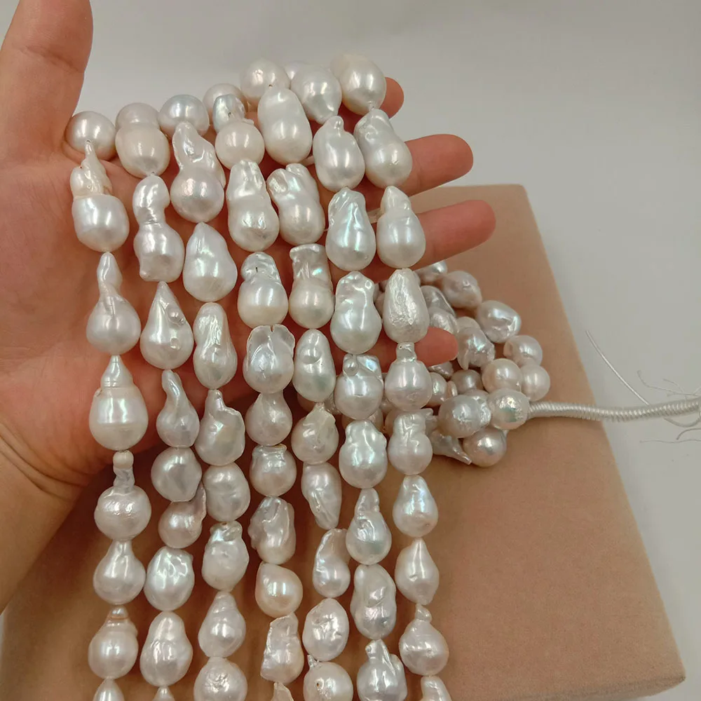 

16 inch 11-14 mm good luster tear drop nature baroque freshwater pearl in strand, AA have flaw few repaired,nature white color