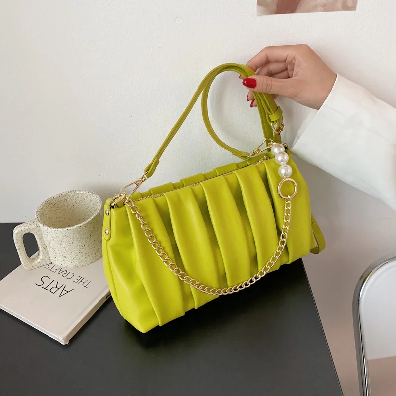 

Women's bag 2021 summer new Korean version of fashion art pearl hand-held shoulder bag textured foreign gas pleated stiletto bag