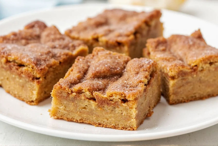Perfectly golden cinnamon toast bars on cooling rack with cinnamon sugar coating visible
