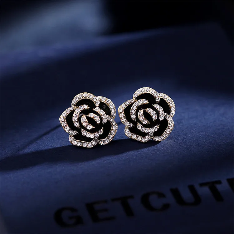 

S925 Silver Needle Flower Earrings Simple And Cold Wind Black And White Explosion Style Rose Small And Cute Earrings