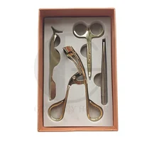 

golden color makeup tools kit curler tweezer and scissor 4 in 1 packaging box set wholesale and retail eyelash tools set