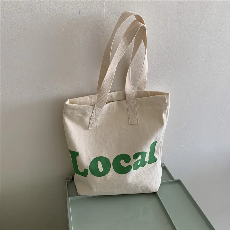 

Custom women 2021 new Korean canvas single shoulder bag letter printing small fresh shopping practical tote bag wholesale, Customized