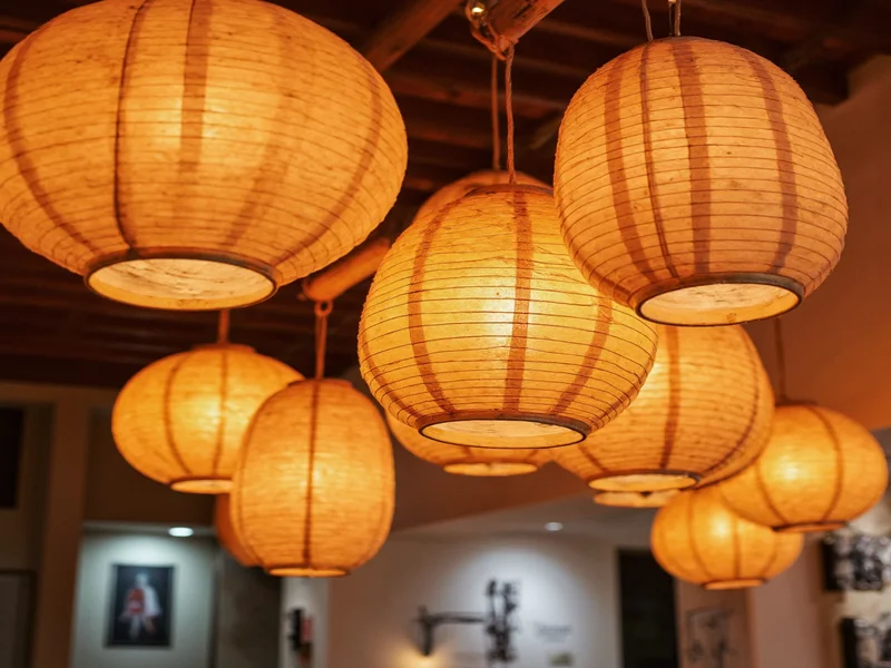 Recycled paper lanterns hanging from ceiling