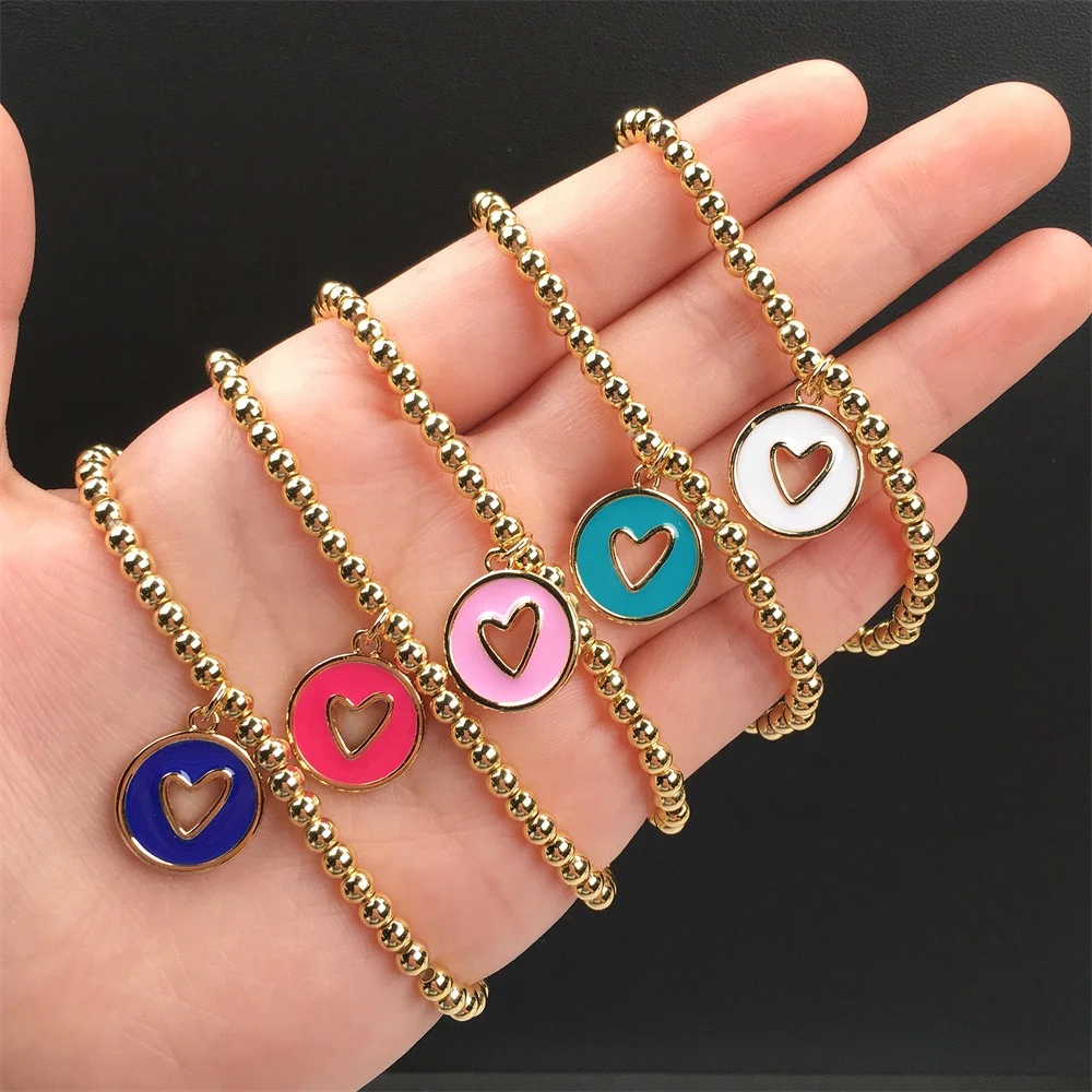 

Personalized vintage jewelry stack colorful enamel hollow heart charm 4mm gold plated beaded Elastic bangle bracelets women