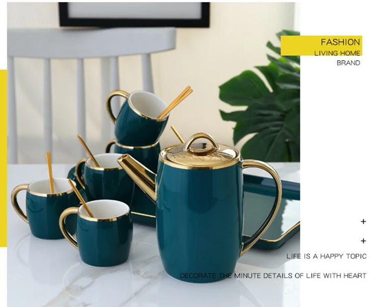 gold rim tea cup and saucer.JPG