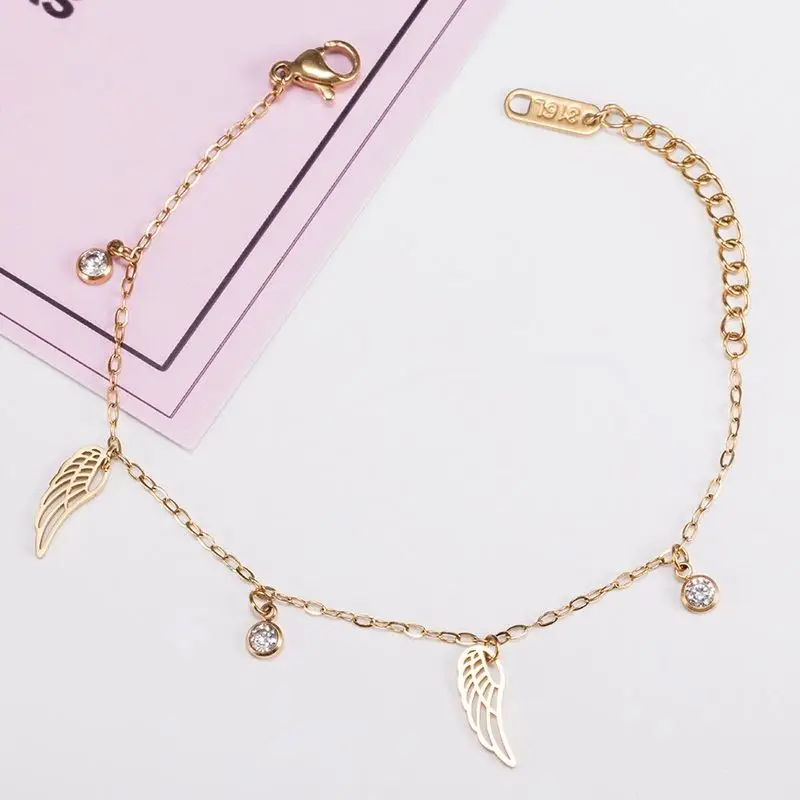 

Latest Design Factory Price Chic Design Angel Wing Stainless Steel Zircon Pendant Women Bracelets, Gold color