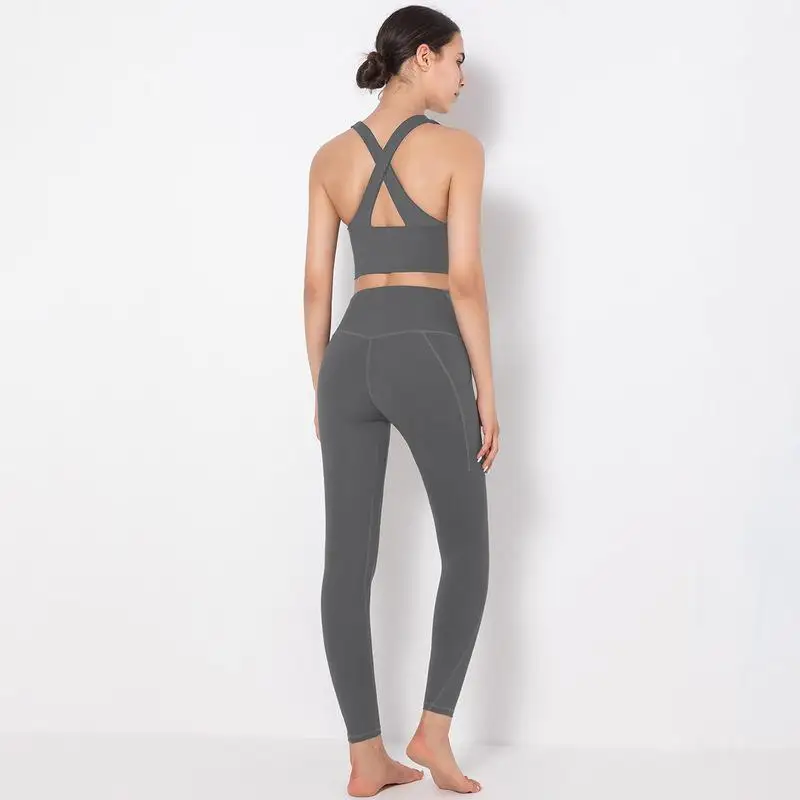 

Women Solid Cross Strap Back Pocket Yoga Fitness Workout Set Suit