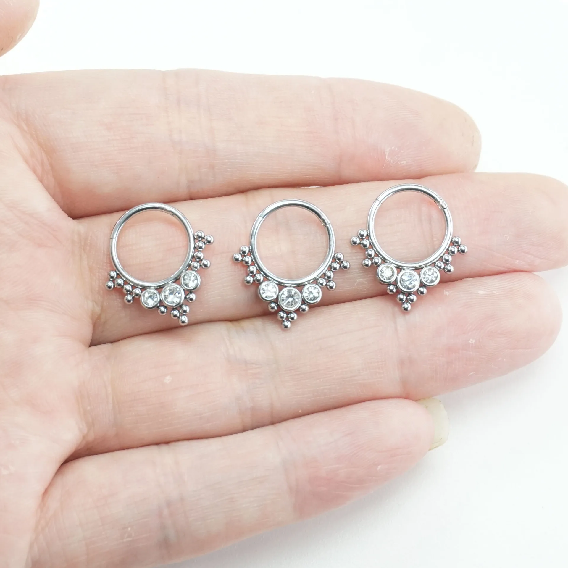 

POENNIS Surgical Steel Dual Stacked Ball Nose Piercing 7 Zircon Bezel Paved Connecting Hinged Nose Rings, Silver(if need other color,welcome to contact us)