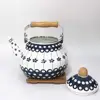Cheap portable china large novelty quick boil steel kettle with wood handle