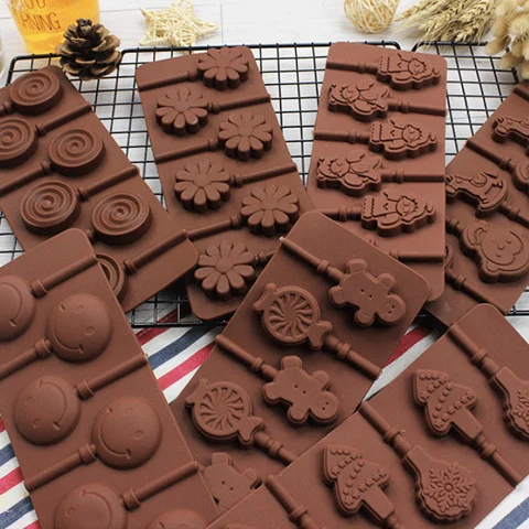 

Wholesale 3D Round Angels Smiling Faces Flowers Stars and Heart Shape Silicone Chocolate Hard Candy Lollipop Molds Tray