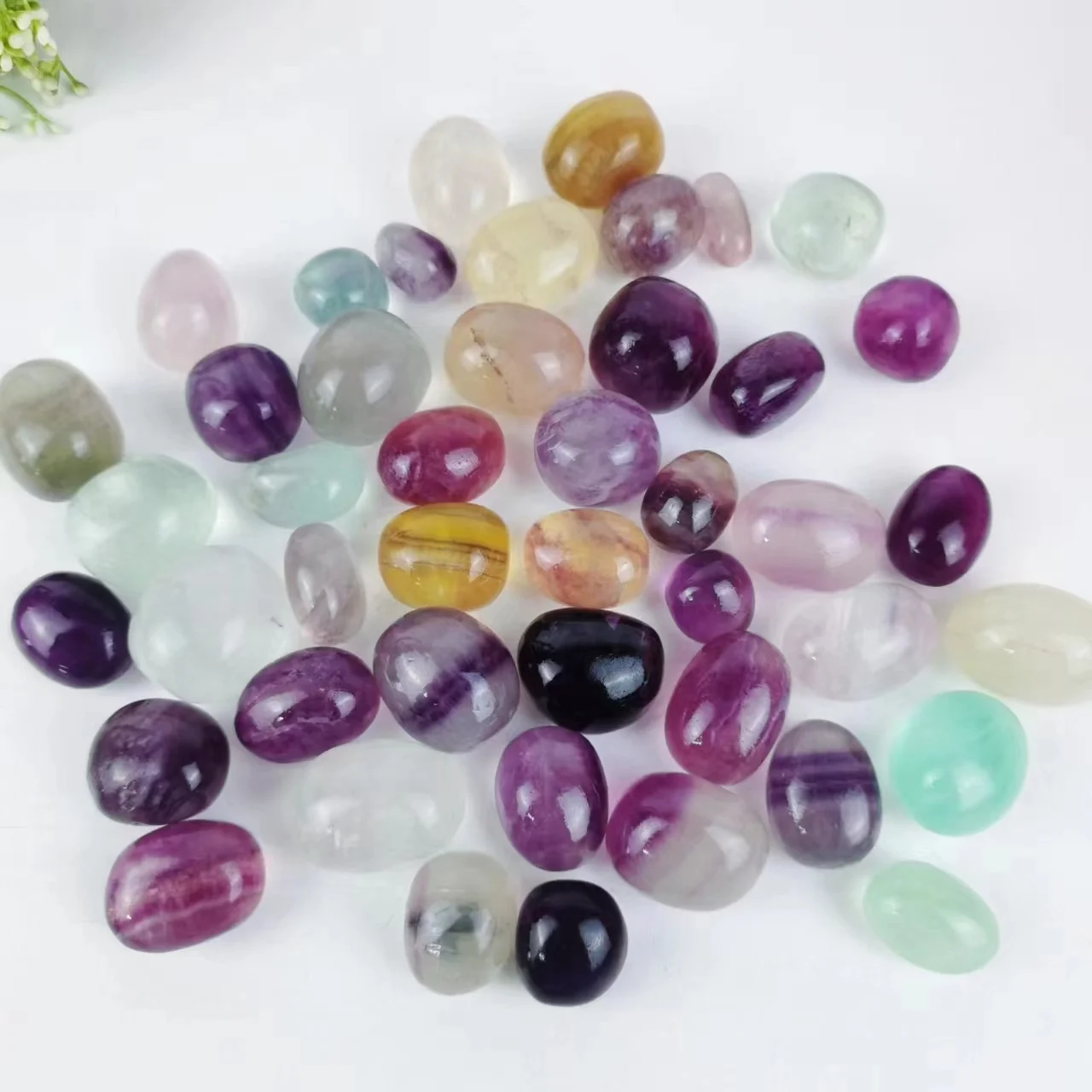 

Wholesale Crystal Healing Stones Candy Fluorite Tumble Rainbow Fluorite Tumble Stones For Decoration