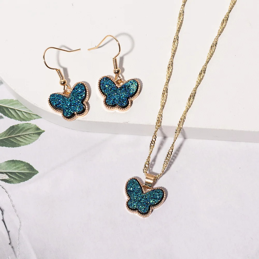 

European American fashion jewelry wholesale cross-border bling resin butterfly pendent choker gold necklace earrings 2-piece set