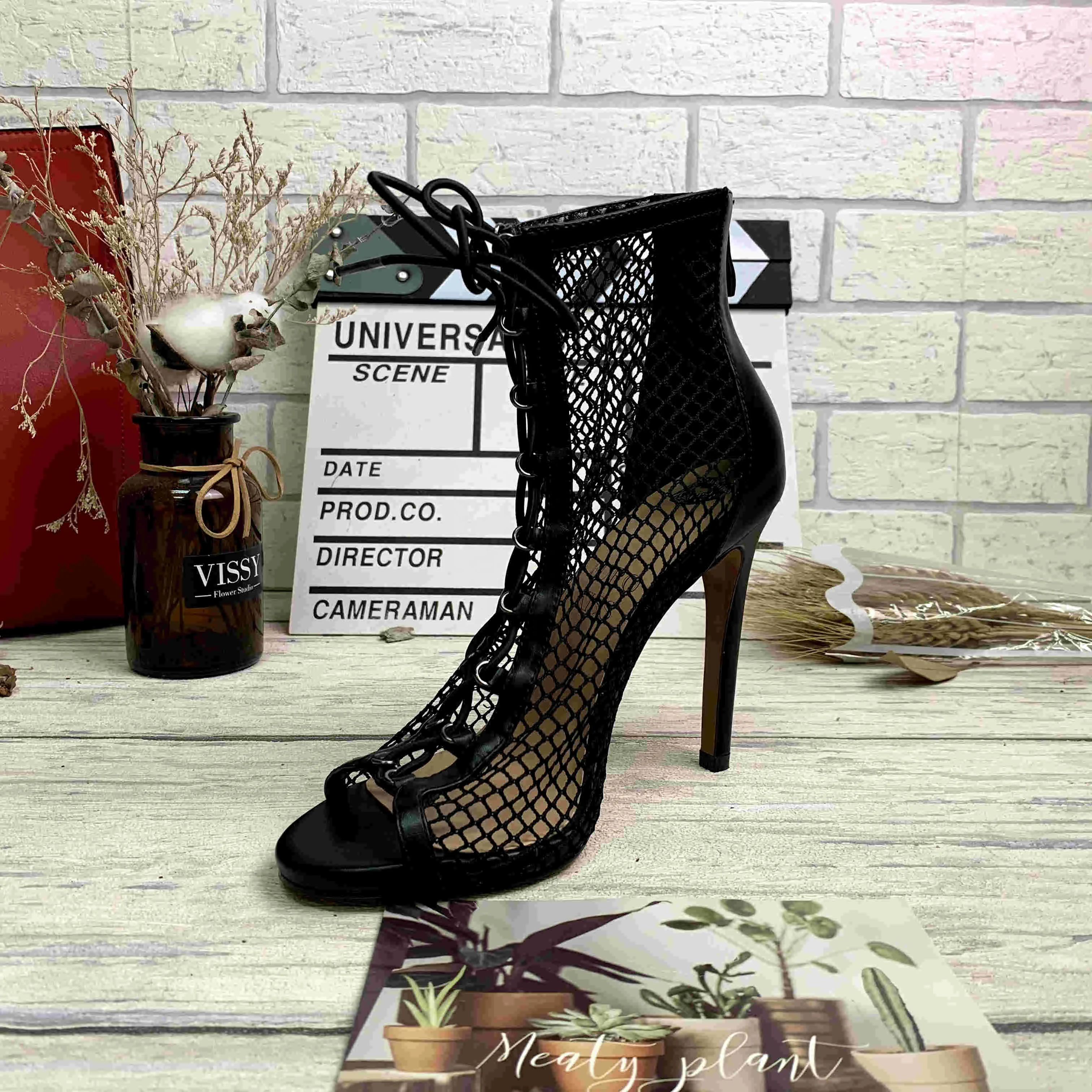 

2021 spring new rear zipper fishing net black strap stiletto high heel women's boots Europe and America large size wholesale