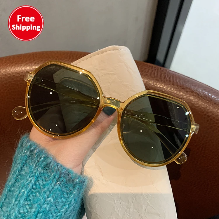 

Free shipping/dorp shipping New Korean fashion female retro round frame Hong Kong style trendy beach glasses