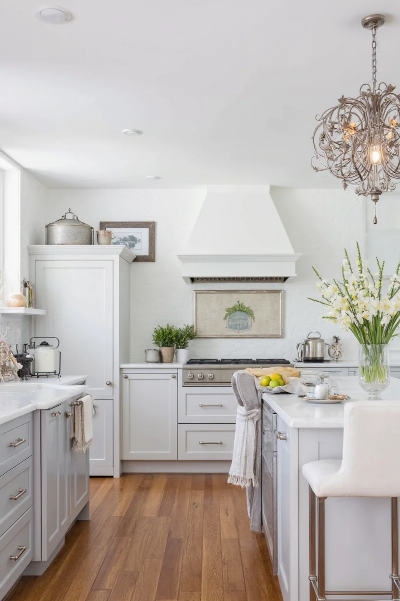 Gray kitchen with pendant lighting over island