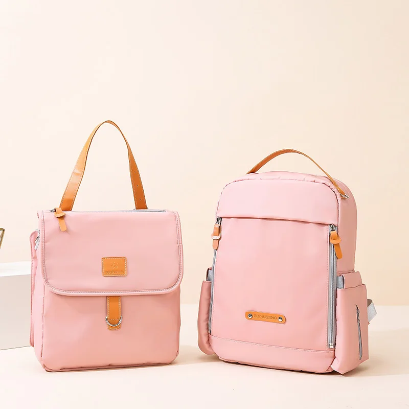 

High quality waterproof multifunction detachable 2 in 1 nappy backpack travel baby 2021 luxury diaper bag set