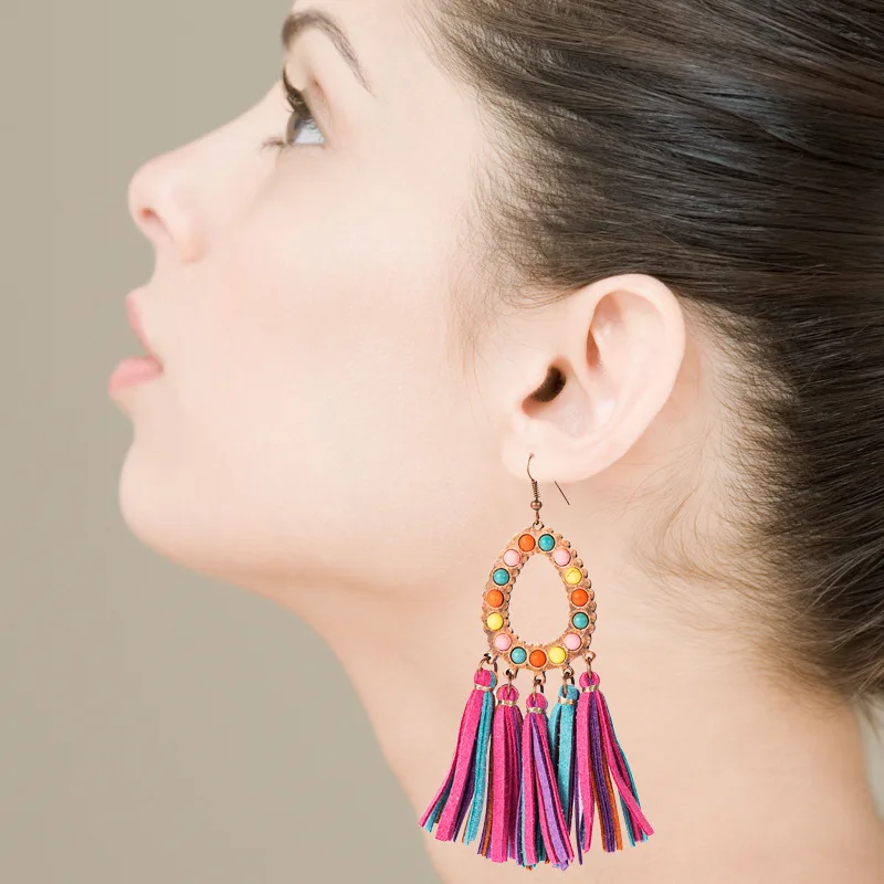 

European and American original design Bohemian pine stone handmade colorful leather tassel long earrings