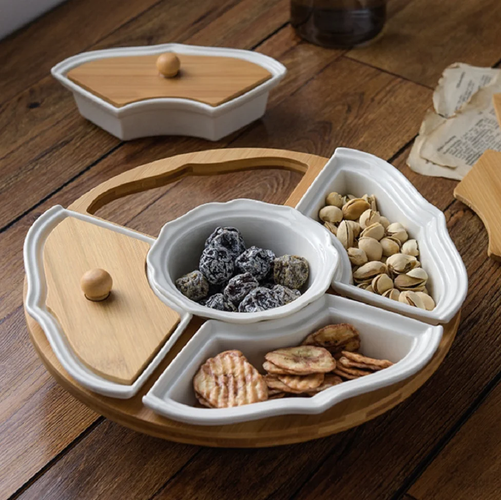 

Hot selling ceramic compartment with lid fruit plate with rotating bamboo base Nordic style fruit and dried fruit display plate