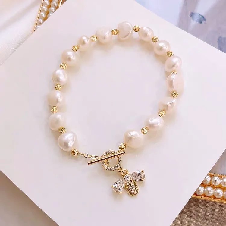 

Wholesale Bee Pendant Hand Accessories Pearl Alloy Bracelet Jewelry for Women, As pictures show