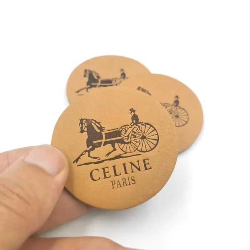 

Chinese manufacturers cheap custom logo size design leather label clothing leather label, Custom color