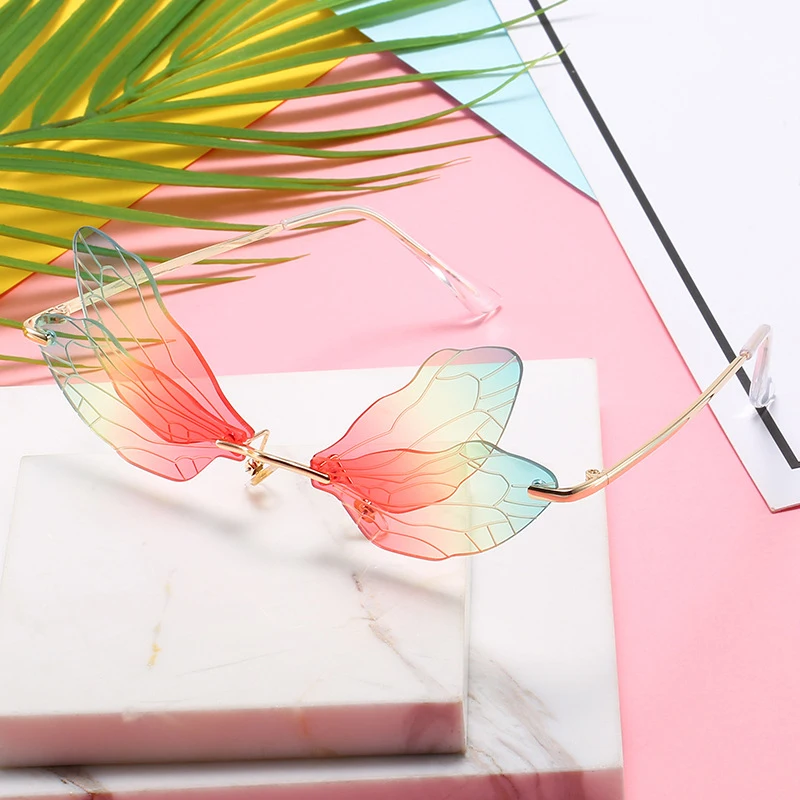 

SKYWAY Popular New Type UV400 Frameless Personalized Women Butterfly Wings Shaped Sunglasses
