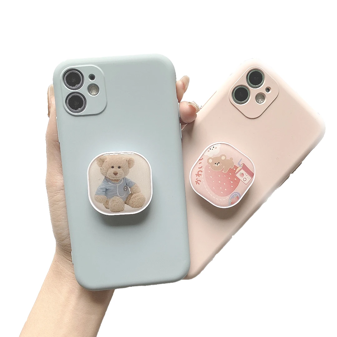 

Factory Price Wholesale Cartoons Mobile Phone Socket Custom Logo Phone Grip Stand Free Sample for Cell Phone holder, Black/white/custom