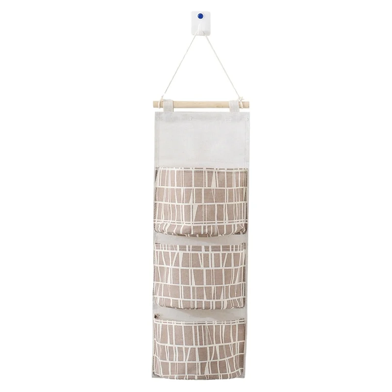 

Factory latest charming deseign Cotton and linen multi-layer 3 grid hanging storage bag wall storage bag fabric behind